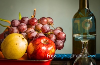 Fruits And A Glass Of Wine Stock Photo