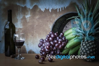 Fruits And Wine On The Old Of Background Stock Photo