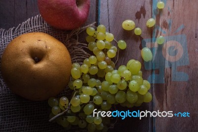 Fruits On A Wooden Stock Photo