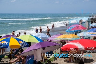 Fuengirola, Andalucia/spain - July 4 : People Enjoying The Beach… Stock Photo