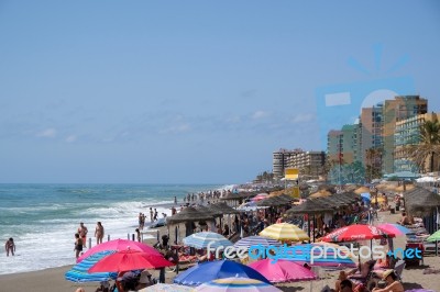 Fuengirola, Andalucia/spain - July 4 : People Enjoying The Beach… Stock Photo