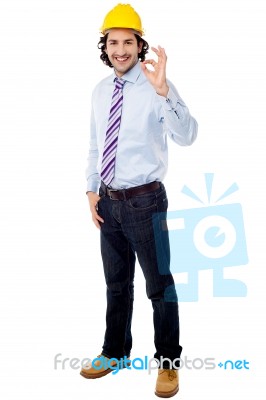 Full Length Image Of Engineer With Ok Sign Stock Photo