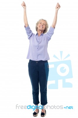 Full Length Image Of Excited Aged Lady Stock Photo