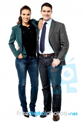 Full Length Of Business Couple Posing Stock Photo