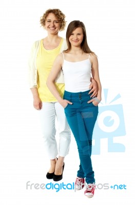 Full Length Portrait Of Mum And Daughter Stock Photo