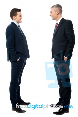 Full Length Portrait Of Two Businessmen Stock Photo