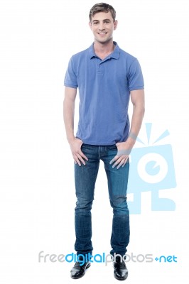 Full Length Portrait Of Young Guy In Casuals Stock Photo