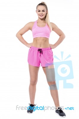 Full Length Pose Of Young Trainer In Sportswear Stock Photo