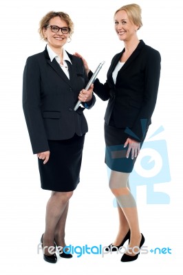 Full Length Shot Of Corporate Female Friends Stock Photo