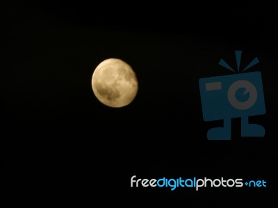 Full Moon At Night In The City Shining Bright  Stock Photo