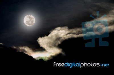 Full Moon On Cloudy Day Stock Photo