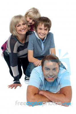 Fun Loving Family Exhibiting Great Bonding Stock Photo