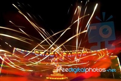 Funfair Ride With Neon Light Stock Photo