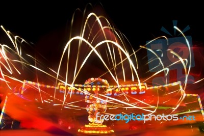 Funfair Ride With Neon Light Stock Photo