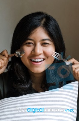 Funny Girl With Spoon And Fork Stock Photo