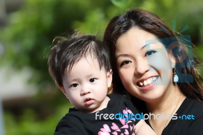 Funny Malaysian Family Stock Photo