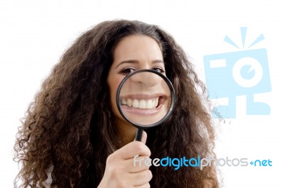 Funny Woman Showing Her Magnified Teeth Stock Photo