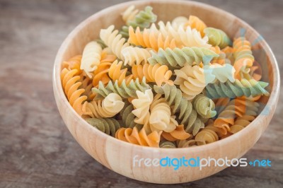 Fusili Pasta In Wooden Plate Stock Photo