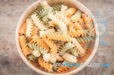 Fusili Pasta In Wooden Plate Stock Photo