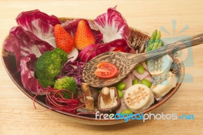 Fusion Food,vegetable Salad,ham And Mushrooms With Wooden Spoon Stock Photo