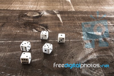 Gambling Dice On Wooden Background Stock Photo