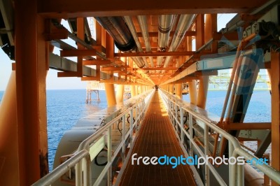 Gangway Or Walk Way In Oil And Gas Construction Platform, Oil And Gas Process Platform, Remote Platform For Production Oil And Gas, Construction In Offshore Stock Photo