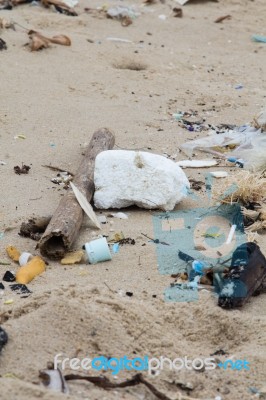 Garbage On The Beach Stock Photo