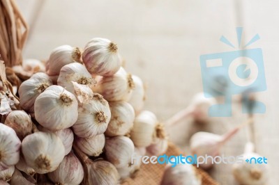 Garlic On The Wooden Stock Photo