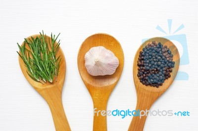 Garlic With Rosemary And Black Peppercorn Isolated On White Stock Photo