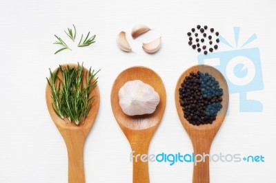 Garlic With Rosemary And Black Peppercorn White Stock Photo