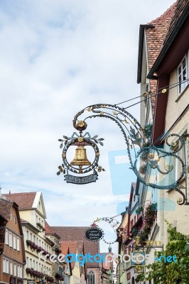 Gasthof Hanging Sign In Rothenburg Stock Photo