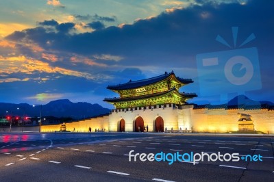 Geyongbokgung Palace And Car Light At Sunset In Seoul, South Korea Stock Photo