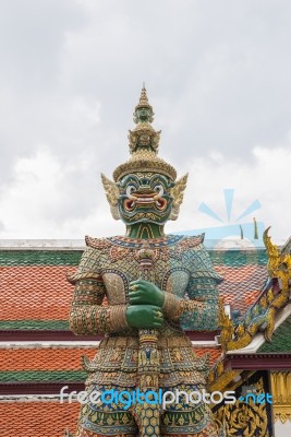 Giant Statue At Wat Phra Kaew, Temple Of The Emerald Buddha, Bangkok, Thailand Stock Photo