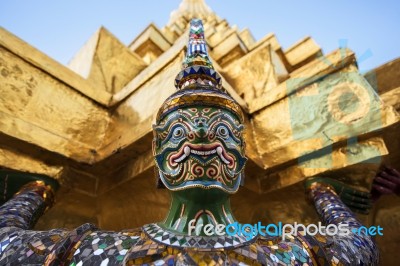 Giant Statue Carrying Gold Pagoda At Wat Phra Kaew Stock Photo