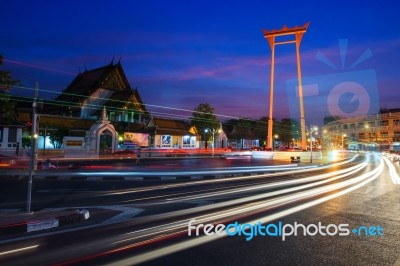 Giant Swing And Wat Suthat Temple At Twilight In Bangkok, Stock Photo