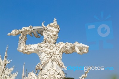 Giant - Wat Rong Khun Stock Photo