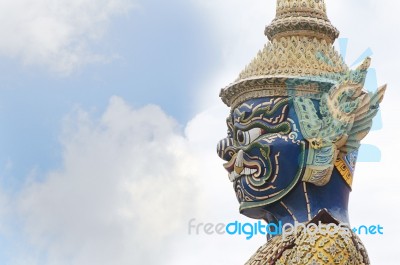 Giants Statue On Sky Background At Wat Phra Kaew In Bangkok, Thailand Stock Photo