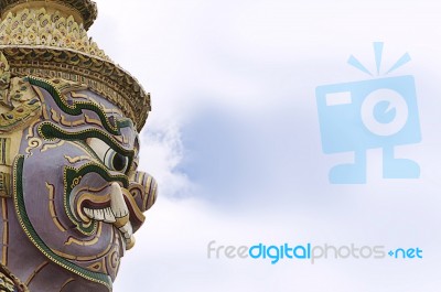 Giants Statue On Sky Background At Wat Phra Kaew In Bangkok, Thailand Stock Photo