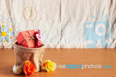 Gift Bags On A Wooden Stock Photo