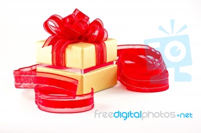 Gift Box And Red Ribbon Stock Photo