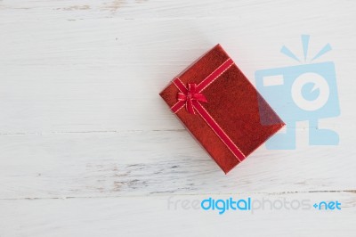 Gift Box Decoration On Wooden Floor Background For Seasonal Holidays Concept Ideas  Stock Photo