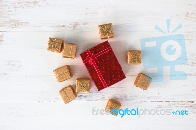 Gift Box Decoration On Wooden Floor Background For Seasonal Holidays Concept Ideas  Stock Photo