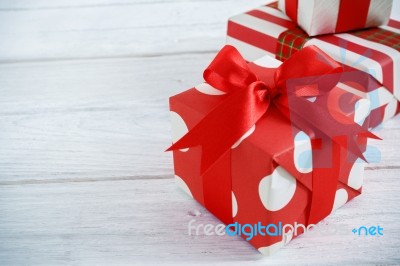 Gift Box With Red Ribbons Stock Photo