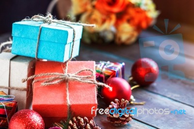 Gift On A Wooden Table Stock Photo