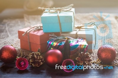 Gift On A Wooden Table Stock Photo