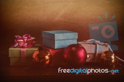 Gift On The Wooden Floor Stock Photo