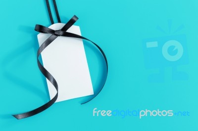 Gift Tag On Blue Background Stock Photo