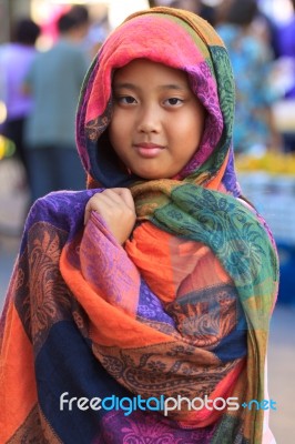 Girl And Silk Clothes Cover Her Head Stock Photo