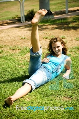 Girl Doing Exercise In Outdoor Stock Photo