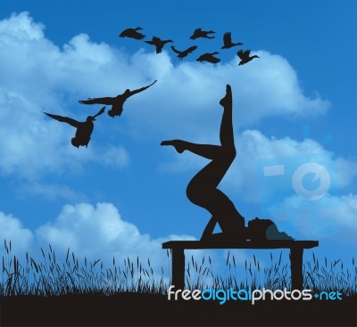 Girl Doing Yoga On Bench Stock Image